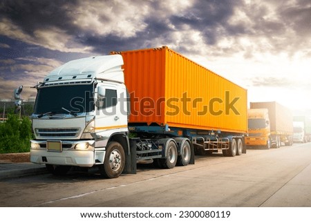 Semi Trailer Trucks Driving on The Road. Shipping Container Trucks. Commercial Truck Transport. Delivery. Diesel Tractor. Freight Trucks Logistics, Cargo Transport.