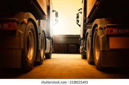 Semi Trailer Trucks on Parking at Distribution Warehouse with The Sunset. Truck Wheels Tires. Auto Service Shop. Shipping Trucks. Lorry Tractor. Industry Freight Trucks Logistics Cargo Transport.	
 - Shutterstock ID 2138221493