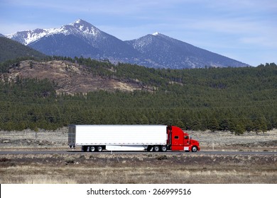 Semi Truck Going Fast On Mountain Highway