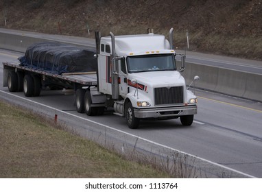 Semi Truck on the High way with Space for Copy