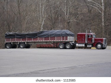 Semi Truck With Tarp Covering Load