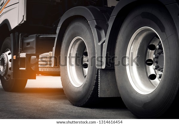 semi truck, truck tire\
and truck wheel.