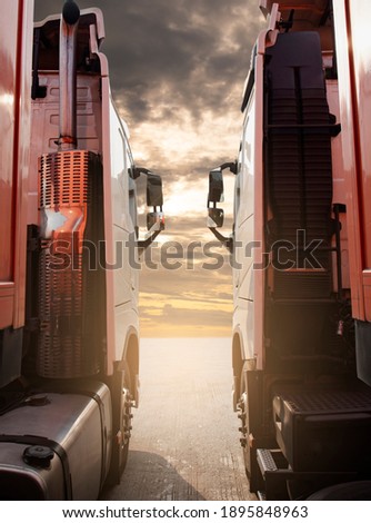 Semi truck trailer parking at sunset sky. Industry freight truck transportation.