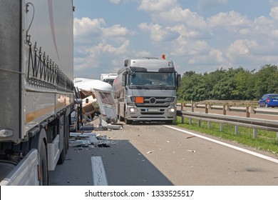 Semi Trucks And Camper Trailer Traffic Accident At Highway