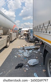 Semi Trucks And Camper Trailer Traffic Accident At Highway