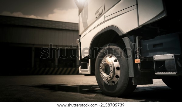 Semi Trucks Parked Parked at The
Warehouse. Diesel Trucks. Lorry Tractor. Industry Freight Trucks
Logistics Cargo
Transport.	
