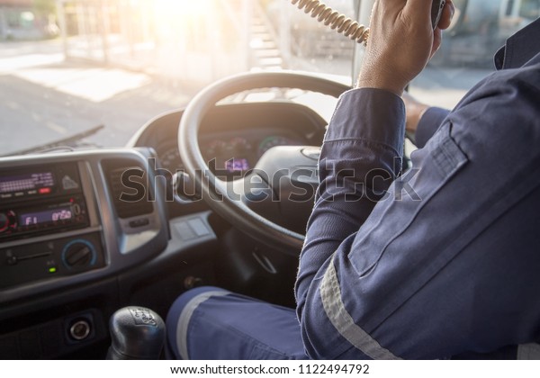 semi\
truck,Truck Driver Making Talking Through\
Radio.