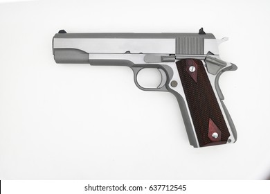 semi-automatic pistol on white background
