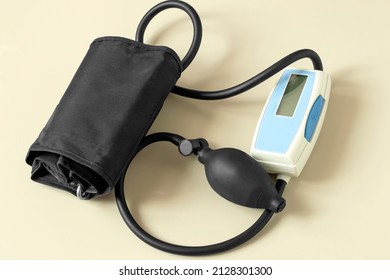 Semi-automatic Tonometer For Measuring Blood Pressure At Home. It Is Equipped With Electronic Unit, Cuff And Pear For Pumping Air With Pressure Relief Valve