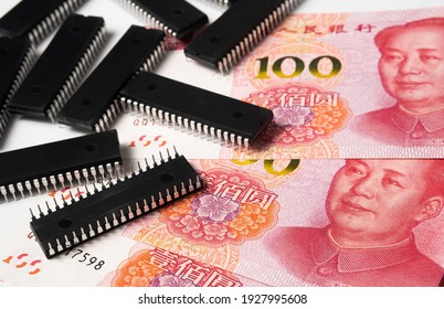 Semiconductor Chips Shortage And High Price. Pile Of Computer Chips And Spread Of  Chinese Yuan Banknotes. Concept For Crisis In The Industry.