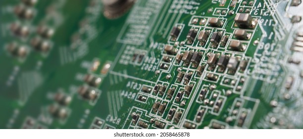 Semiconductor. cpu chip located on the green motherboard of the computer. Semi conductor motherboard circuit board. Hightech computer board with manufacture chip pcb technology. Smart phone iot chip.