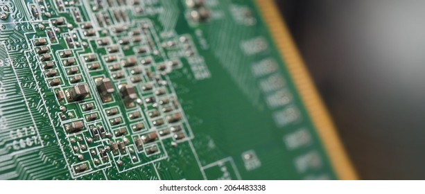 Semiconductor. cpu chip located on the green motherboard of the computer. Semi conductor motherboard circuit board. Hightech computer board with manufacture chip pcb technology. Smart phone iot chip.
