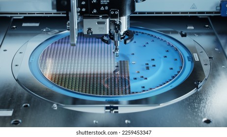 Semiconductor Packaging Process. Computer Chips are being Extracted by a Pick and Place Machine from Semiconductor Wafer and Attached to Substrate. Computer Chip Manufacturing at Factory