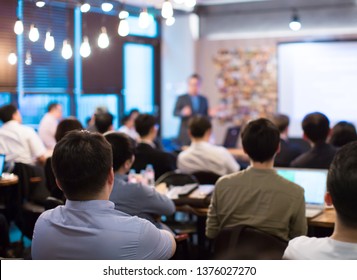 Seminar Presentation. Conference Speaker Presenting To Audience. Technology Presenter At Corporate Tech Leadership Forum. Executives, Entrepreneurs, Investors In Meeting. Lecture Speech By Manager.
