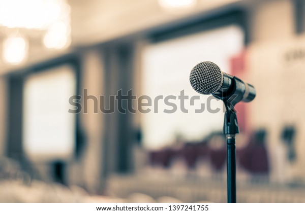 Seminar, speech presentation, town hall meeting,\
in convention lecture hall or business conference room in corporate\
or community event for host or public hearing with microphone voice\
speaker