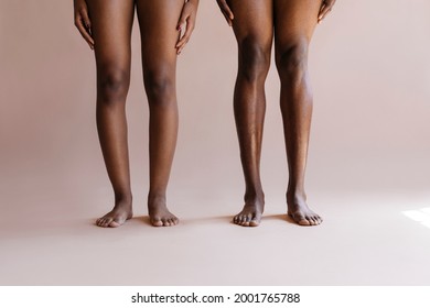 Seminude black couple standing together closeup