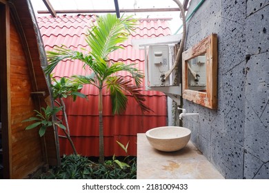 A Semi-outdoor Bathroom In A Beachfront Hotel.