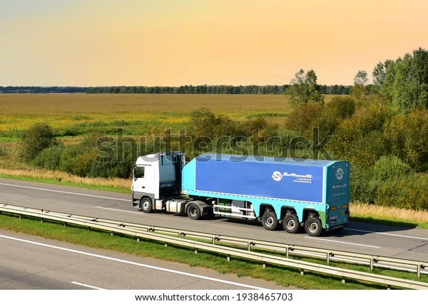 Semi-trailer truck\
by Sovtransavto Trucking Company driving along on the highway.\
MOSCOW REGION - SEPT 16,\
2020