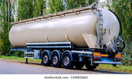 Semi-trailers Of Bulk Tank . Truck Big Cistern . Modern Semi-trailers For Freight Transport . Dry Cargo 