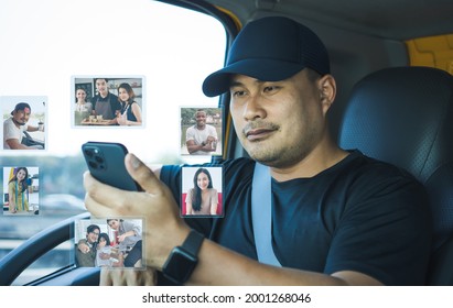 Semi-truck Driver Happy Smiling And Looking Smartphone In His Hand Show Images Virtual People. Bearded Asian Man Video Call To Chat And Greet Friends And Family With Modern Communication Technology.