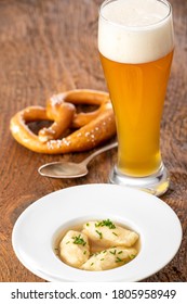 Semolina Dumplings In Broth On Wood