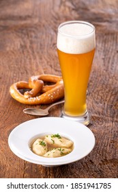 Semolina Dumplings In Broth On Wood