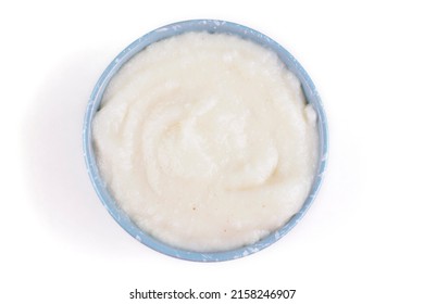 Semolina Porridge In A Blue Bowl On A White Isolated Background Close-up, Top View. Baby Food.