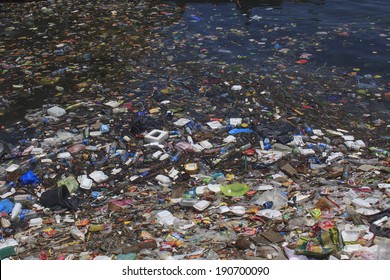 SEMPORNA, MALAYSIA - APRIL 24 2014: Plastic Rubbish Pollution In Ocean. Photo Showing Pollution Problem Of Garbage Thrown Directly Into The Sea With No Proper Trash Collection Or Recycling.