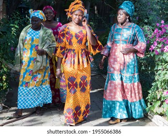 Senegal, Africa - Jan, 2019: Senegalese women in a traditional costume called 'boubou' and a swing on her head