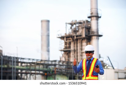 Senier Engineer With Safety Helmet And Safety Vest Doing Audit At Site Line