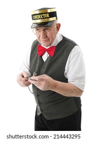 A senior adult conductor holding his pocket watch and looking pleased that the train is coming right on time.  On a white background.