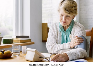 Senior Adult Measuring Blood Pressure 