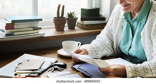 Senior Adult Reading Letter Concept