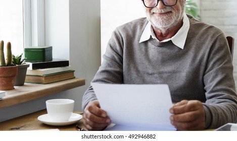 Senior Adult Reading Letter Concept