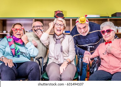 Senior Adults In A Nursing Home For The Elderly Having Fun