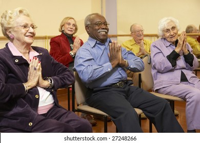 Senior Adults In A Stretching Class