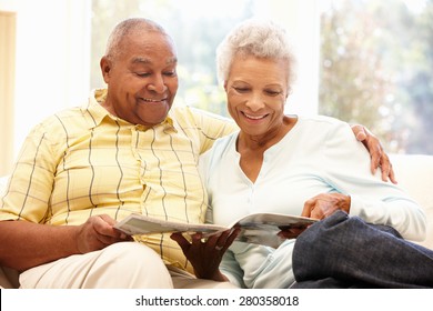 Senior African American couple reading - Powered by Shutterstock