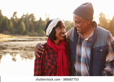 Senior African American Couple Walking By Lake