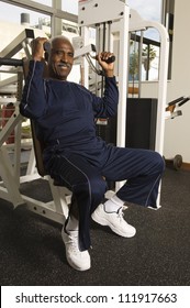 Senior African American Man Exercising In Gym