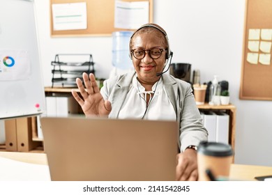 Senior African American Woman Call Center Agent Having Video Call At Office