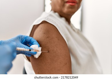 Senior African American Woman Patient Having Vaccination At Clinic