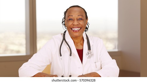 Senior African Doctor Smiling At Camera