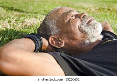 Senior African man relaxing in the African sun