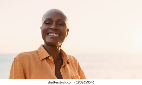 Senior African woman having fun during summer holidays - Happiness and elderly people lifestyle concept  - Powered by Shutterstock