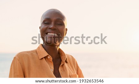 Senior African woman having fun during summer holidays - Happiness and elderly people lifestyle concept 