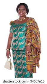 senior African woman with traditional Ghana clothing, green dress and white handbag