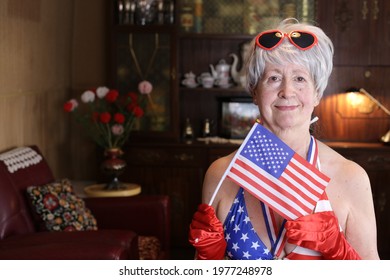 Senior American Woman Cheerleading In A Bikini