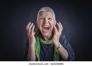 Senior Angry Enraged Woman Yelling, Pissed Off, Black Background