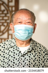 Senior Asian Man, Chinese Ethnicity. Wearing Medical Face Mask. Portrait, Close Up Shot.