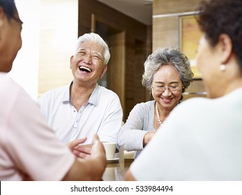 Senior Asian People Getting Together And Having A Good Time